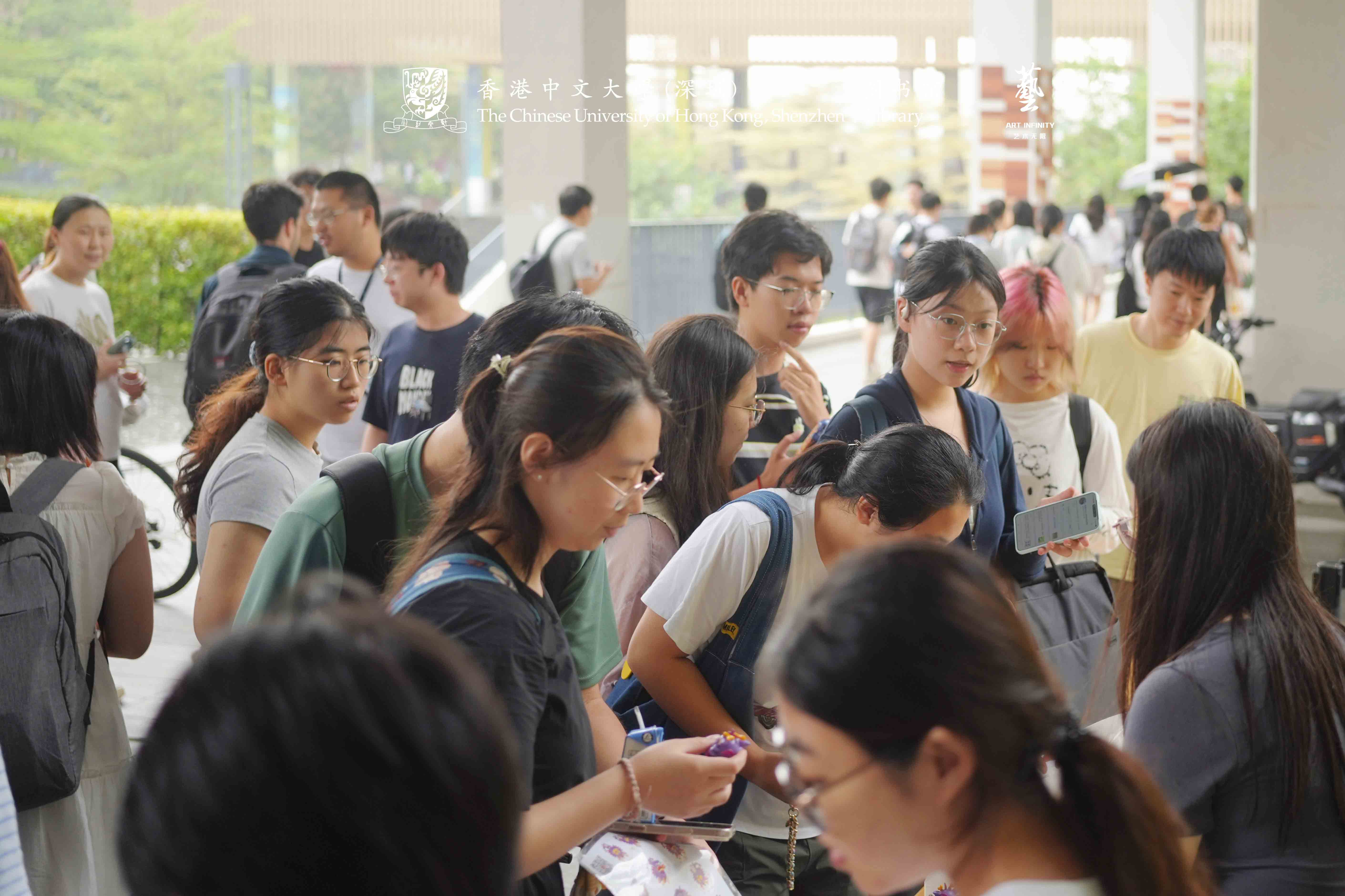 Students engaging with library WeChat platform