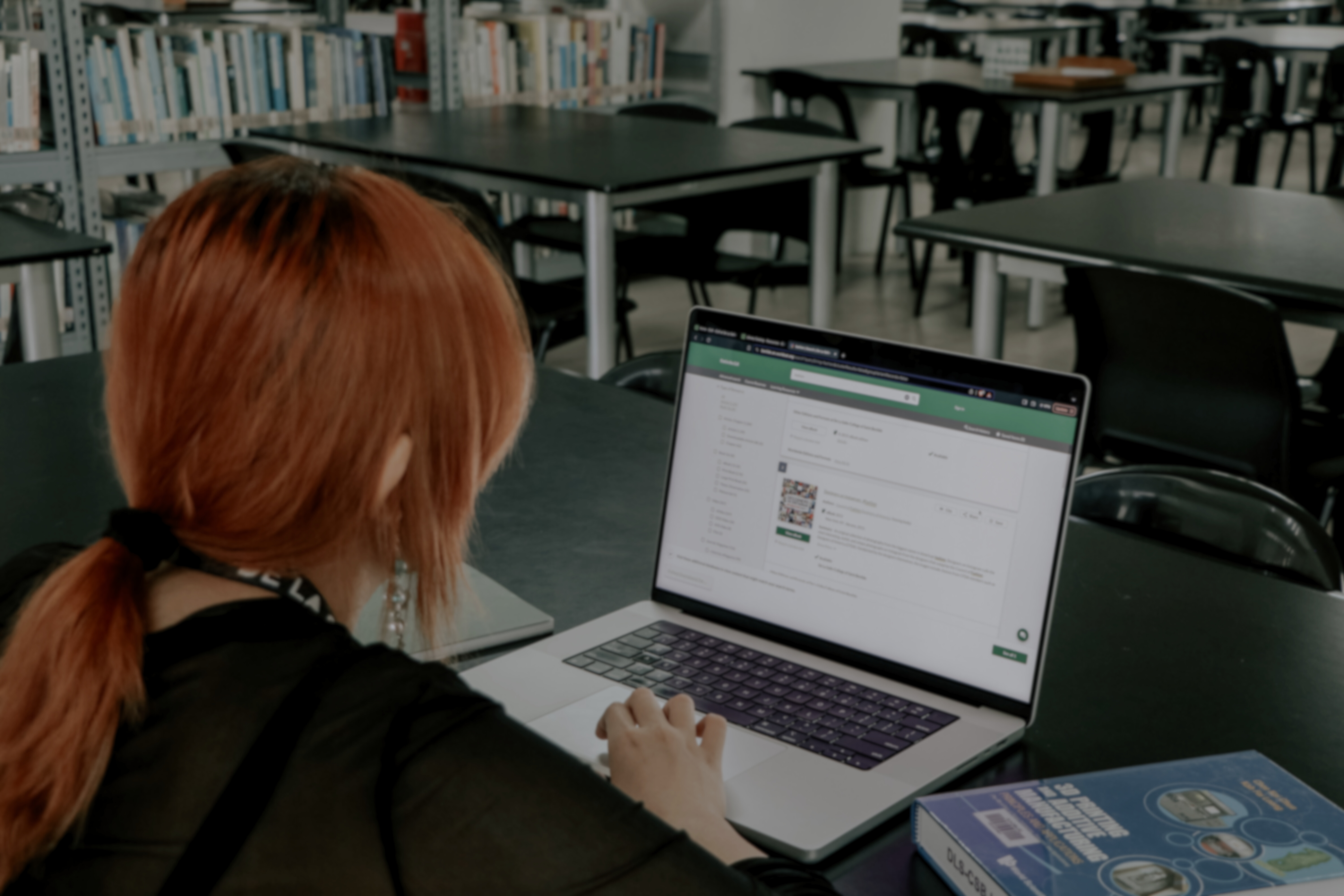 Benilde students researching in library