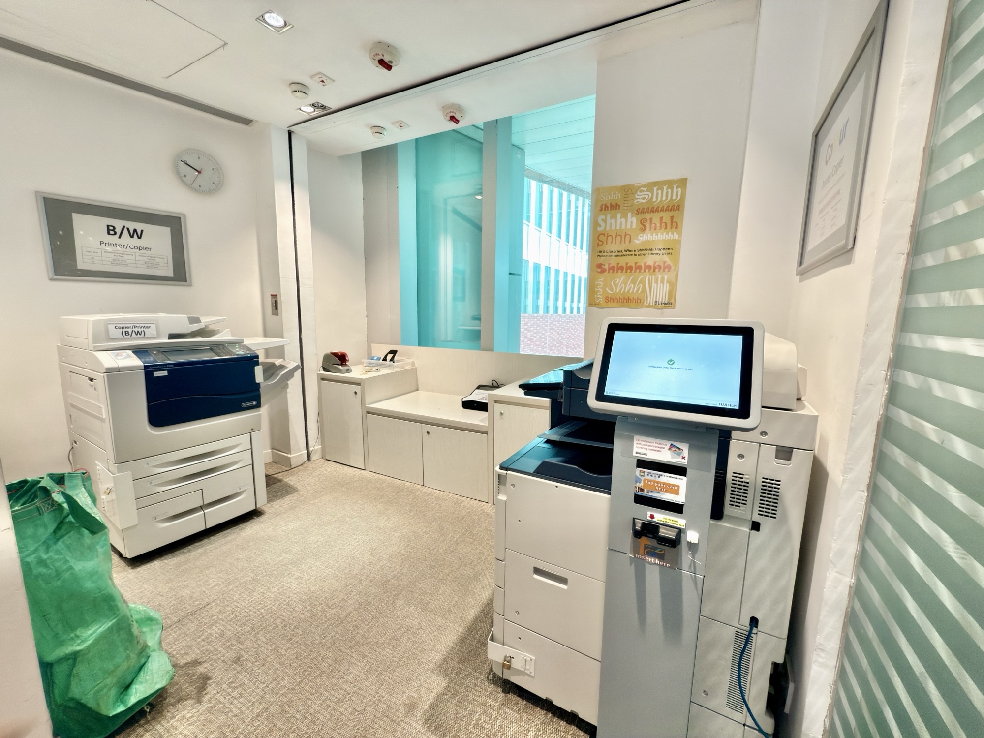 Black-and-white printer and color printer in the printing room on 1/F