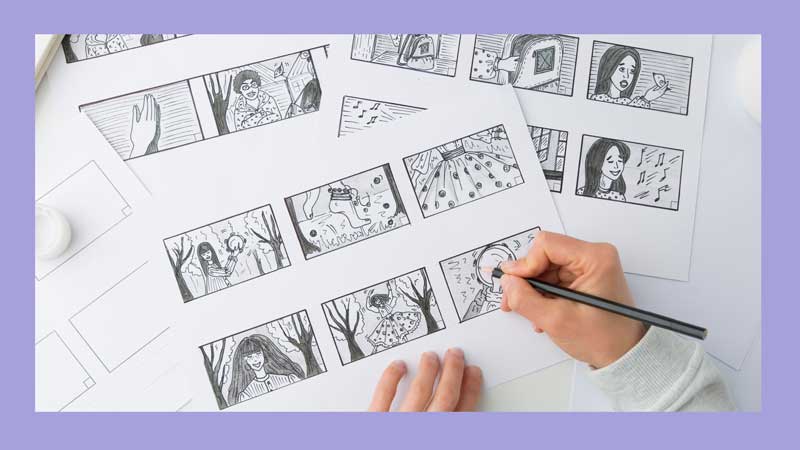 A group of people standing in front of green plants