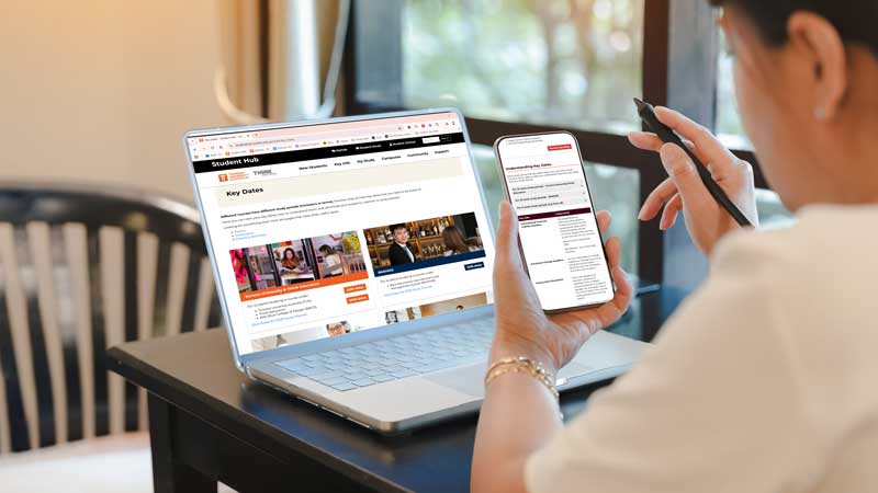 Overhead view of iPad, book and keyboard