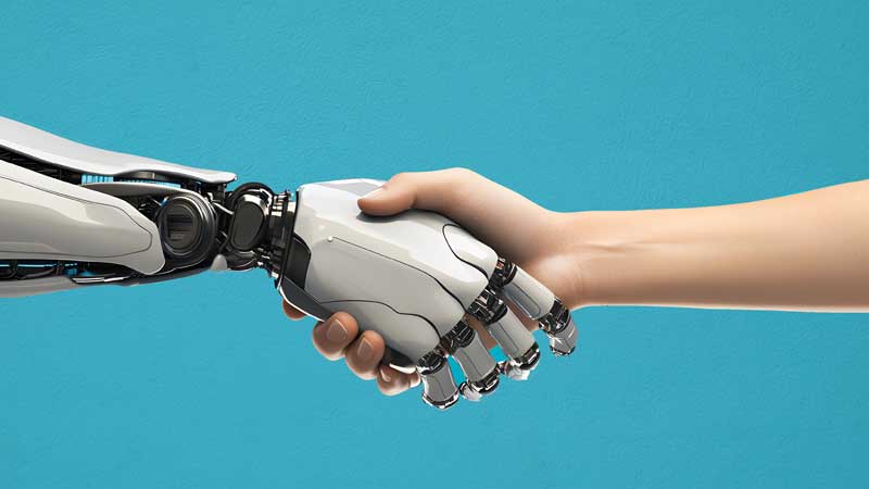 A robot hand shaking a human hand against a blue background